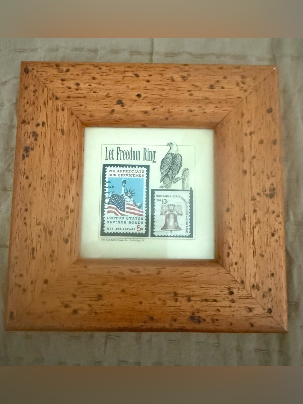 Framed Art – Natural Wood Frame with Patriotic Postage Stamps and Print.